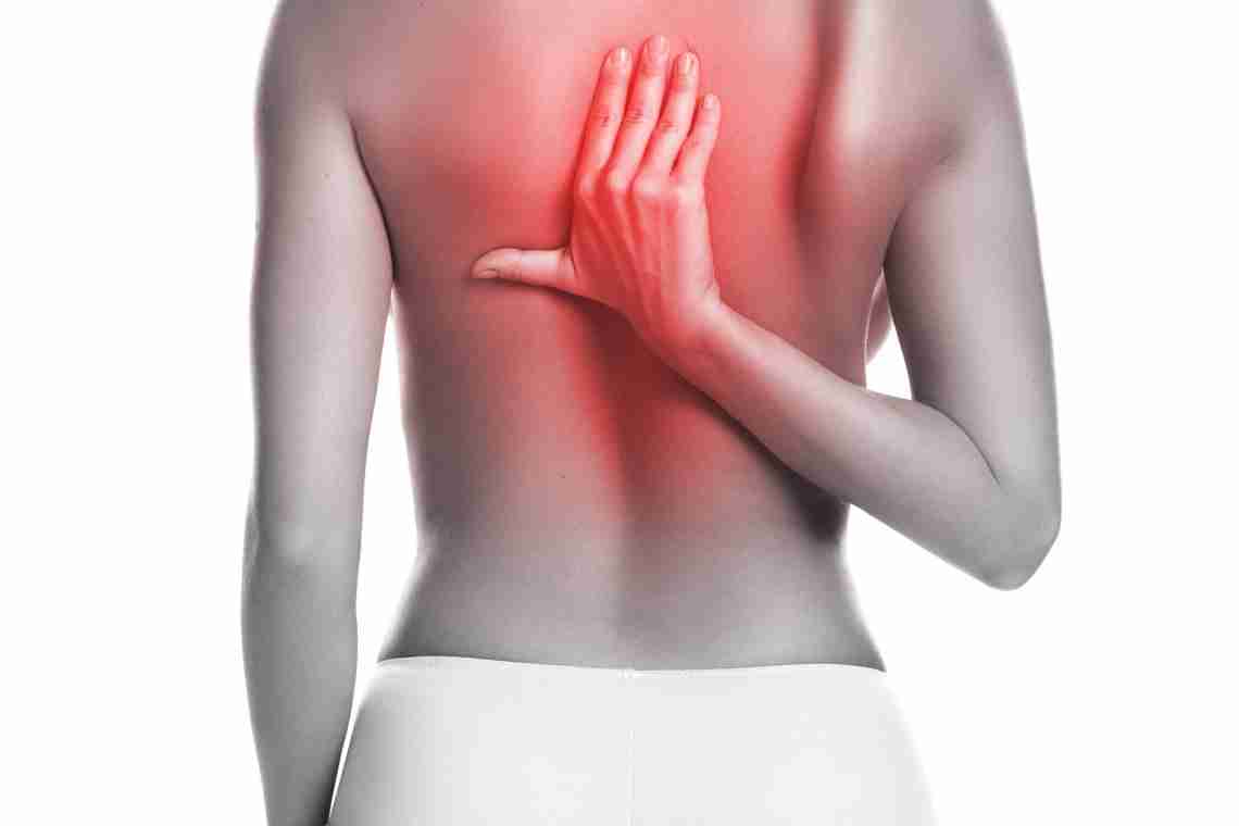 Боль справа в спине – причины и лечение